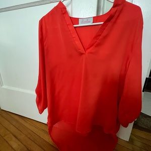 Red/orange mid-sleeve top by Charlee